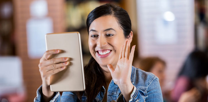 Teacher looking at tablet